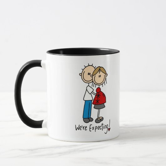 Wir erwarten Babyt-shirts und -geschenke Tasse (Links)