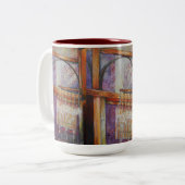 Wir fliegen alle Motten um das gleiche Licht. Zweifarbige Tasse (Vorderseite Links)