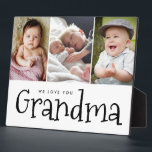 Wir Liebe Sie Oma mehrere Großkinder Fotos Fotoplatte<br><div class="desc">Das "Customizable 'We Liebe You Oma' Foto Easel Plaque" ist ein herzliches und nachdenkliches Geschenk, das die besondere Bindung zwischen einer Oma und ihren Enkelkindern feiert. Diese wunderschön gestaltete Tafel ermöglicht es Ihnen, mehrere hochgeschätzte Fotos der Enkel zu präsentieren, was sie zu einem wahrhaft personalisierten und sentimentalen Sake macht. Die...</div>