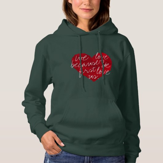 Wir Liebe, weil er zuerst grün Hoodie (Vorderseite)
