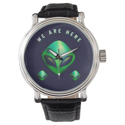 "Wir sind hier" grüner Alien-Kopf Armbanduhr (Vorderseite)