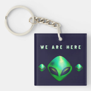 "Wir sind hier" grüner Alien-Kopf Schlüsselanhänger
