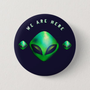 "Wir sind hier" grüner Außerirdischer Kopf Button
