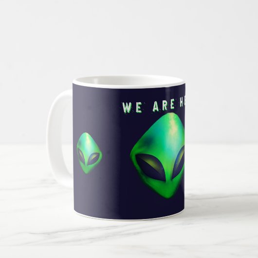 "Wir sind hier" grüner Außerirdischer Kopf Kaffeetasse (Vorderseite Links)