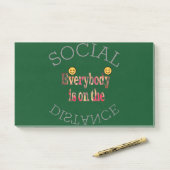 Wir werden COVID-19 überleben - eine Botschaft der Post-it Klebezettel (Auf Schreibtisch)