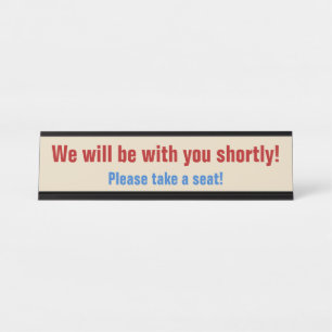 "Wir werden in Kürze bei Ihnen sein!" Schreibtischnamensplakette