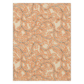 Wirbelnde orangefarbene Blätter auf beigem Hinterg Tischdecke (Vorderseite)