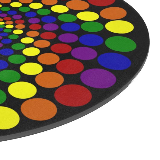 Wirbelndes Farbrad auf schwarzem Schneidebrett (Ecke)