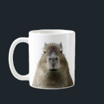 Witzige und niedliche Tasse Capybara<br><div class="desc">Beginnen Sie Ihren Tag mit einem Lächeln! Diese Tasse besticht durch den unbeeindruckten und langweiligen Gesichtsausdruck einer zauberhaften Capybara, die sich perfekt für Tierfreunde mit dem Gefühl des Spaßes eignet. Fügen Sie beliebig anpassbaren Text hinzu oder entfernen Sie ihn. Diese Capybara Tasse ist hier, um das Rampenlicht zu stehlen! Mit...</div>