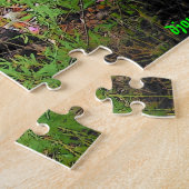 Wölbende schwarze Katze auf Treibholz Puzzle (Seite)