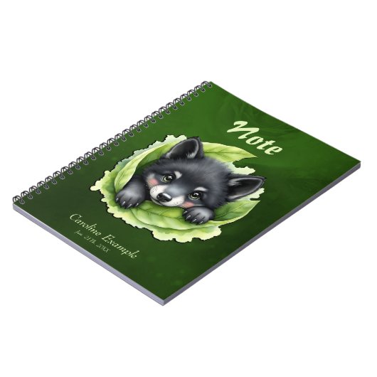Wolf cub in the green notizblock (Linke Seite)