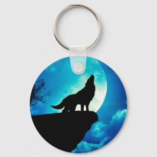 Wolf in der Silhouette heult auf Vollmond Schlüsselanhänger