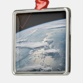 Wolken in Sumatra, Indonesien. Ornament Aus Metall (Links)