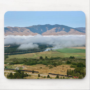 Wolken über dem Fluss Flathead Mousepad