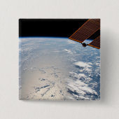 Wolkenformationen rund um den Sonnenuntergang vor  Button (Vorderseite)