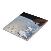 Wolkenformationen rund um den Sonnenuntergang vor  Fliese (Seite)