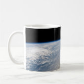 Wolkenformationen rund um den Sonnenuntergang vor  Kaffeetasse (Links)