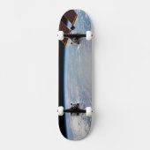 Wolkenformationen rund um den Sonnenuntergang vor Skateboard (Vorderseite)