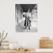 Woman holding a rifle on a porch poster (Küche)