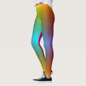 Woman in rainbow gradient leggings with a subtle  (Links)