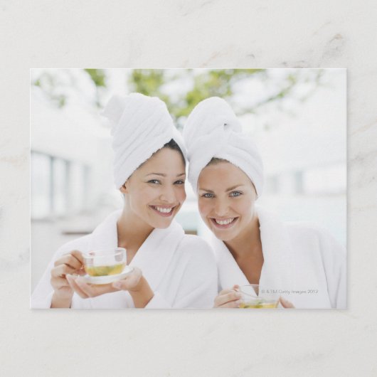 Women in bathrobes drinking tea at spa postkarte (Vorderseite)