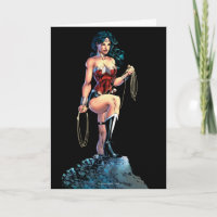 Wonder Woman Gripping Lasso Atop Rock