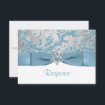 Wonderland Bat Mitzvah UAWG RSVP Karte<br><div class="desc">****Bitte beachten Sie, dass der Bänder, Bogen, Glitzer und Silberstar auf Bildern DRUCKT sind und nicht echt sind. Diese elegante, blaue, silbergraue IMITAT Glitzer Damask Muster Bat Mitzvah rsvp Karte hat einen Hintergrund aus mehreren weißen Schneeflocken darauf und ein PRINTED Stahl blaues Band und Bogen mit einem silbergrauen Stern von...</div>