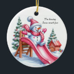 Wunderbarer Pink Snowman Spielplatz Spaß Keramik Ornament<br><div class="desc">Ein reizender kleiner Schneemann mit rosa Accessoires auf einer Rutsche auf einem hellrosa Spielplatz. Weihnachtsbäume mit Dekorationen im schneebedeckten Hintergrund. Die Nachricht sagt: "Ich habe viel Spaß beim Schnee. Fügen Sie diesen Schmuck zu Ihrem rosa Weihnachtsdekor hinzu.</div>