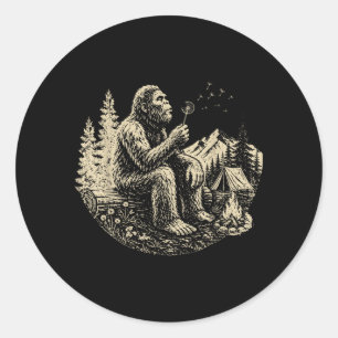Wunschträume Lustiger Bigfoot pustet Löwenzahn Runder Aufkleber
