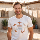 WYNONA Orange & Aquamarin Cowgirl Rodeo Daddy T-Shirt<br><div class="desc">Dieses t Shirt bietet niedliche orangefarbene und aquamarine Cowgirl-Grafiken und die Worte 'rodeo daddy' in einer süßen Rodeo-Schriftart-Kombination. Dieses Papa-Shirt ist das ideale Geschenk für Ihren Lieblingspräsidenten,  ein Shirt zur Geburtstagsfeier,  oder arbeitet als großartige Idee für eine Schwangerschaftsankündigung.</div>