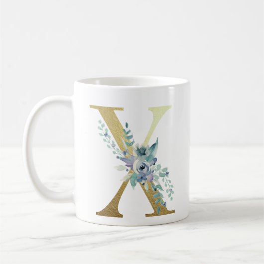 x, goldfarbener Erstling mit blauem Blattwerk Kaffeetasse (Links)