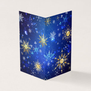 XMAS Blue Background mit goldenen Schneeflocken