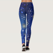 XMAS Blue Background mit goldenen Schneeflocken Leggings (Rückseite)