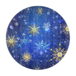 XMAS Blue Background mit goldenen Schneeflocken Schneidebrett