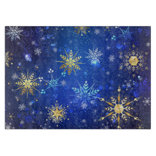 XMAS Blue Background mit goldenen Schneeflocken Schneidebrett