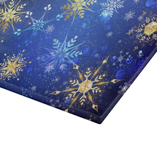 XMAS Blue Background mit goldenen Schneeflocken Schneidebrett (Ecke)