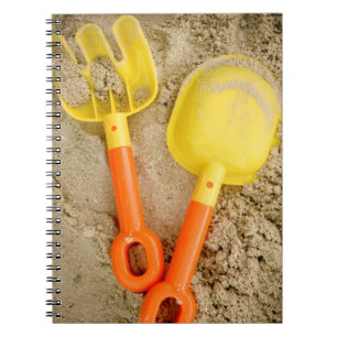 Yellow and Orange Sand Toys Beach Art Notizblock