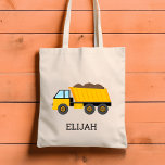 Yellow Dump Truck Kids Personalized Construction Tragetasche<br><div class="desc">This kids' tote bag features an illustration of a yellow dump truck. Personalize it with your child's name in black letters. Makes a great book bag!</div>