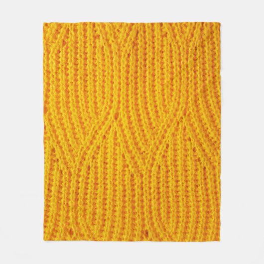 Yellow knitted surface textile material background fleecedecke (Vorderseite)