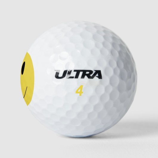 Yellow smile face 001 golfball (Logo)