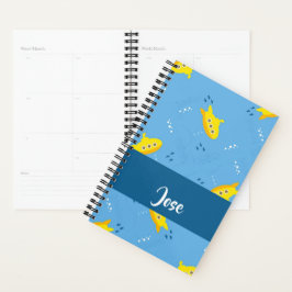 Yellow submarine and fish on blue planer