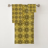 Yellow towels with black geometric patterns badhandtuch set (Insitu)