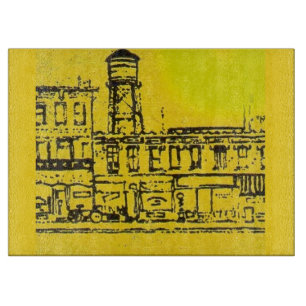 Yellowville-Häuser und -Zuhause und Wasserturm Schneidebrett