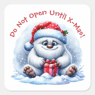 Yeti mit Geschenk – Nicht öffnen Quadratischer Aufkleber