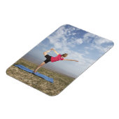 Yoga praktizierende Frau am Strand Magnet (Linke Seite)