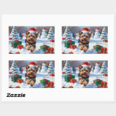 Yorkipoo läuft im Schnee mit Weihnachtshut Rechteckiger Aufkleber (Blatt)