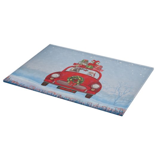 Yorkshire Terrier Hund in Auto mit dem Weihnachtsm Schneidebrett (Ecke)