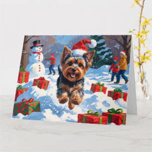 Yorkshire Terrier im Schnee mit Weihnachtsmütze Karte