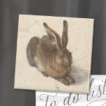 Young Hare | Albrecht Dürer Magnet<br><div class="desc">Albrecht Dürers Young Hare (1502) ist ein detailgetreu detailliertes Aquarellbild, das eine lebensechte Darstellung eines Hasen zeigt. Das Kunstwerk ist bekannt für seinen außergewöhnlichen Realismus und zeichnet sich durch die Beschaffenheit des Haares, das zarte Licht in den Augen und das subtile Schattenspiel aus. Dieses Meisterwerk demonstriert Dürers Fähigkeit zur Beobachtung...</div>