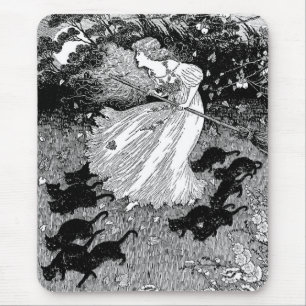 Young witch and black cats mousepad